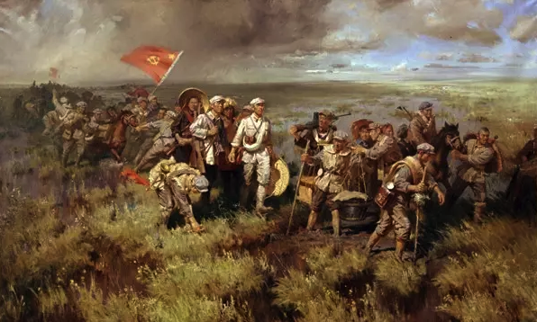 网络图片：红军长征经过的若尔盖草原,图中一位战士弯腰在捡野菜